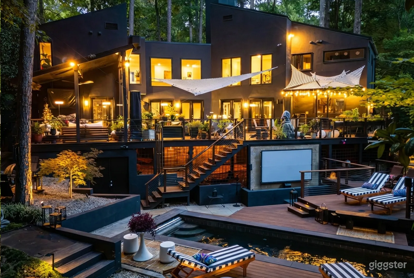 Multi-levelled terrace with lights and plants will host a garden party.