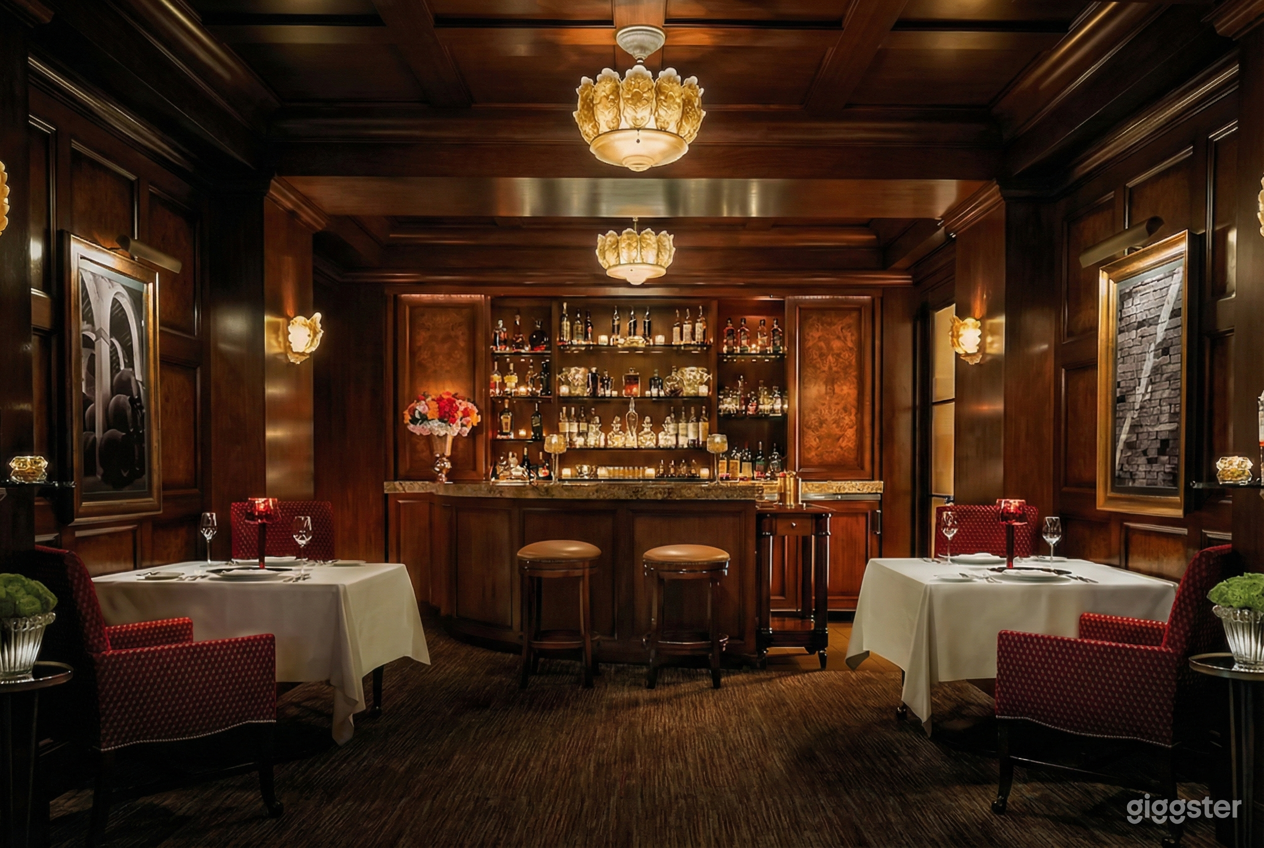 Warmly-styles room with traditional wood and a filled bar with two stools as the focal point.